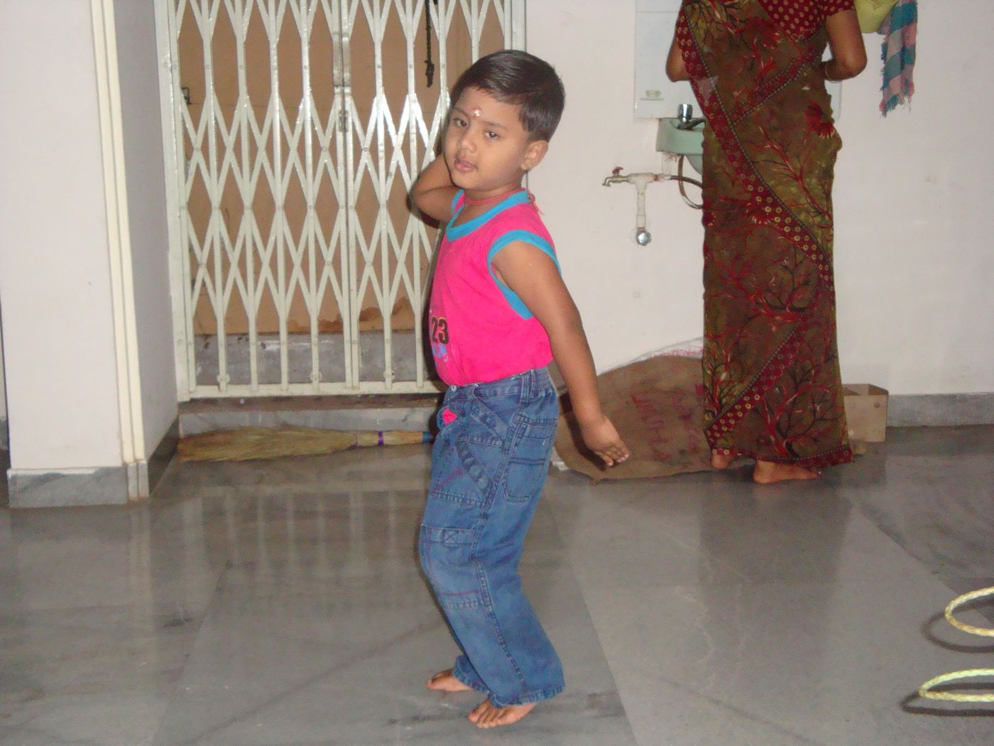 Me as a child dancing in a doorway