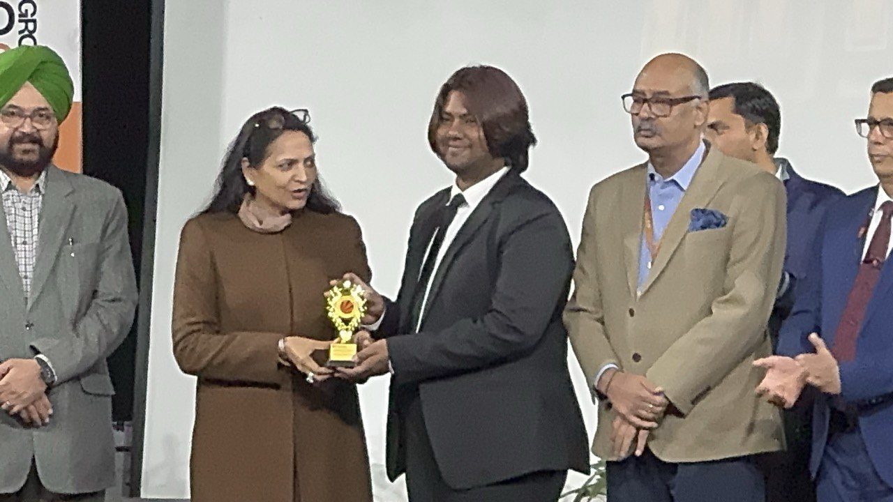 Close up of receiving a trophy on stage