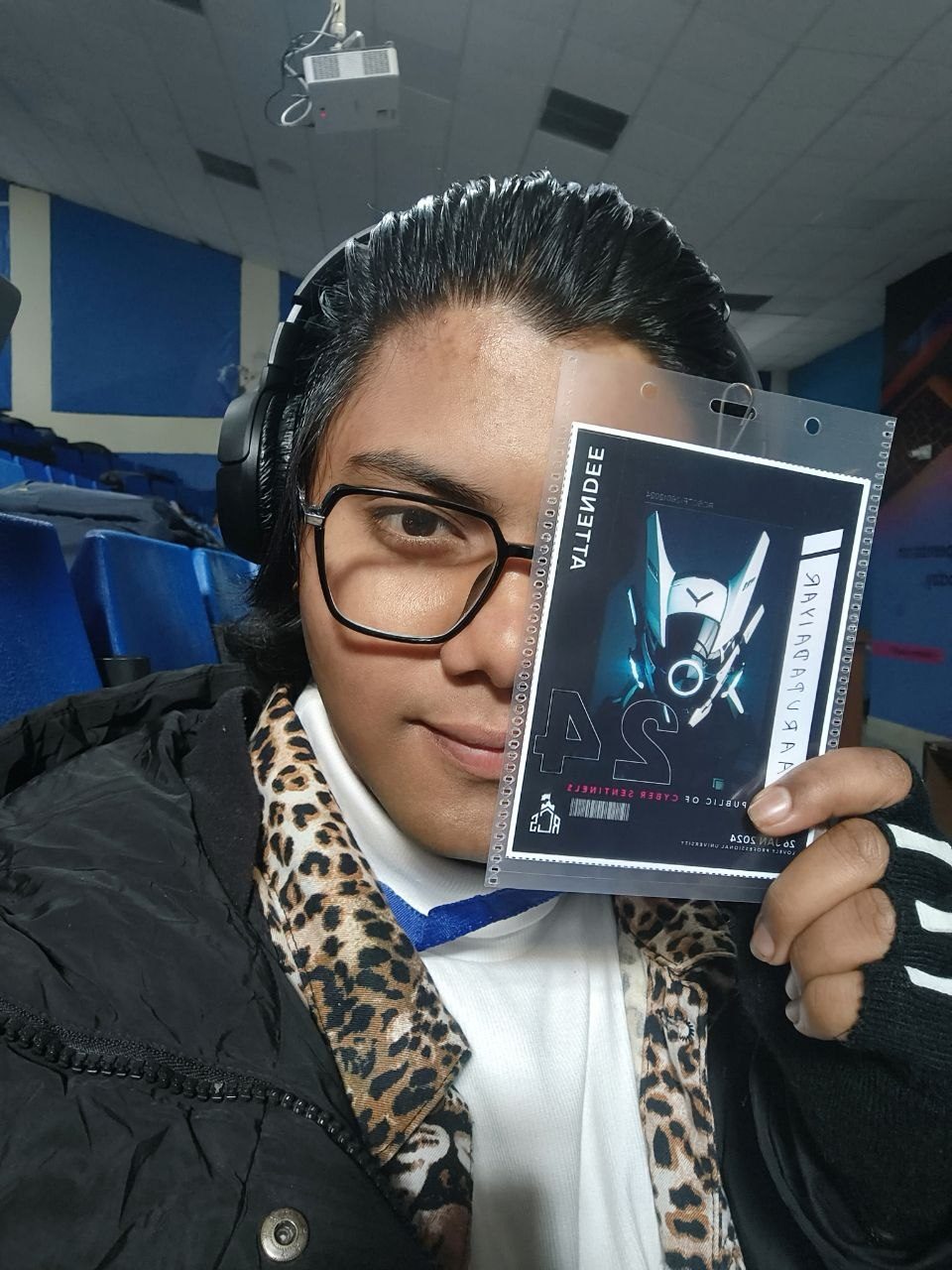 Holding a Cyber Sentinels attendee pass dated 26 January 2024