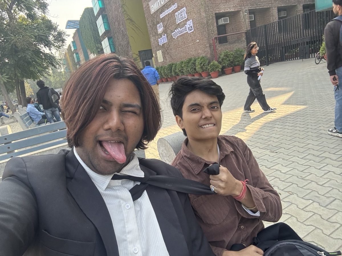 Silly selfie with a friend on a campus bench
