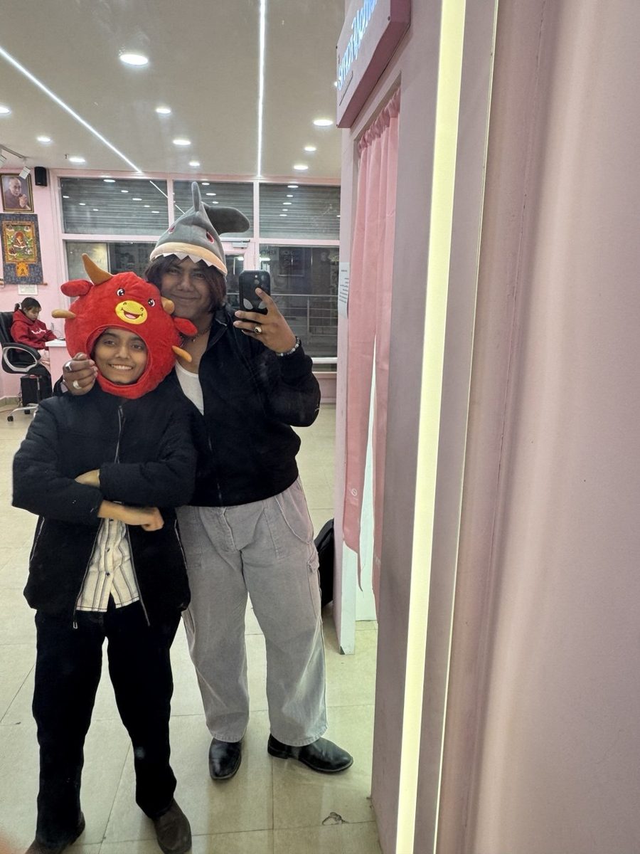 Mirror selfie with a friend in funny animal hats